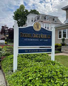 Cockerill, Craig & Moore, LLC Attorneys at Law sign in front of law office